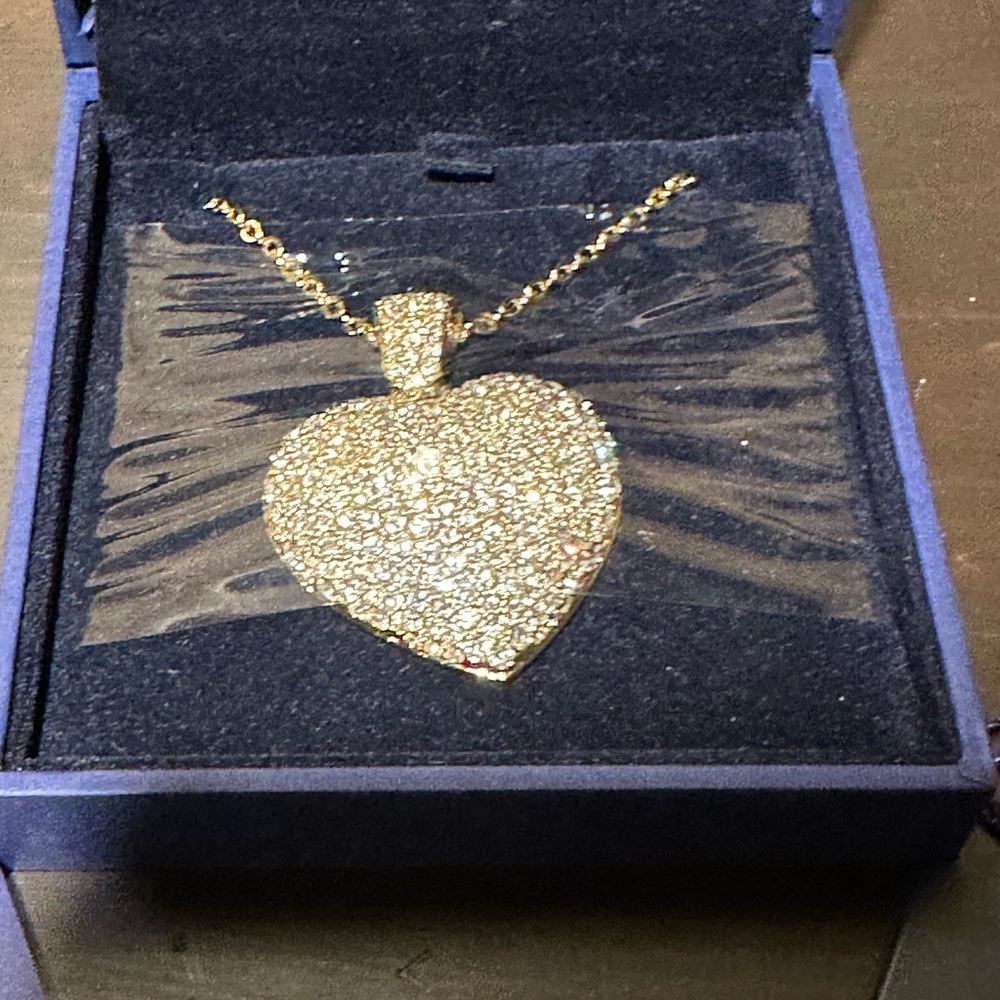 Brand new gold puffed  Swarovski crystal heart necklace.